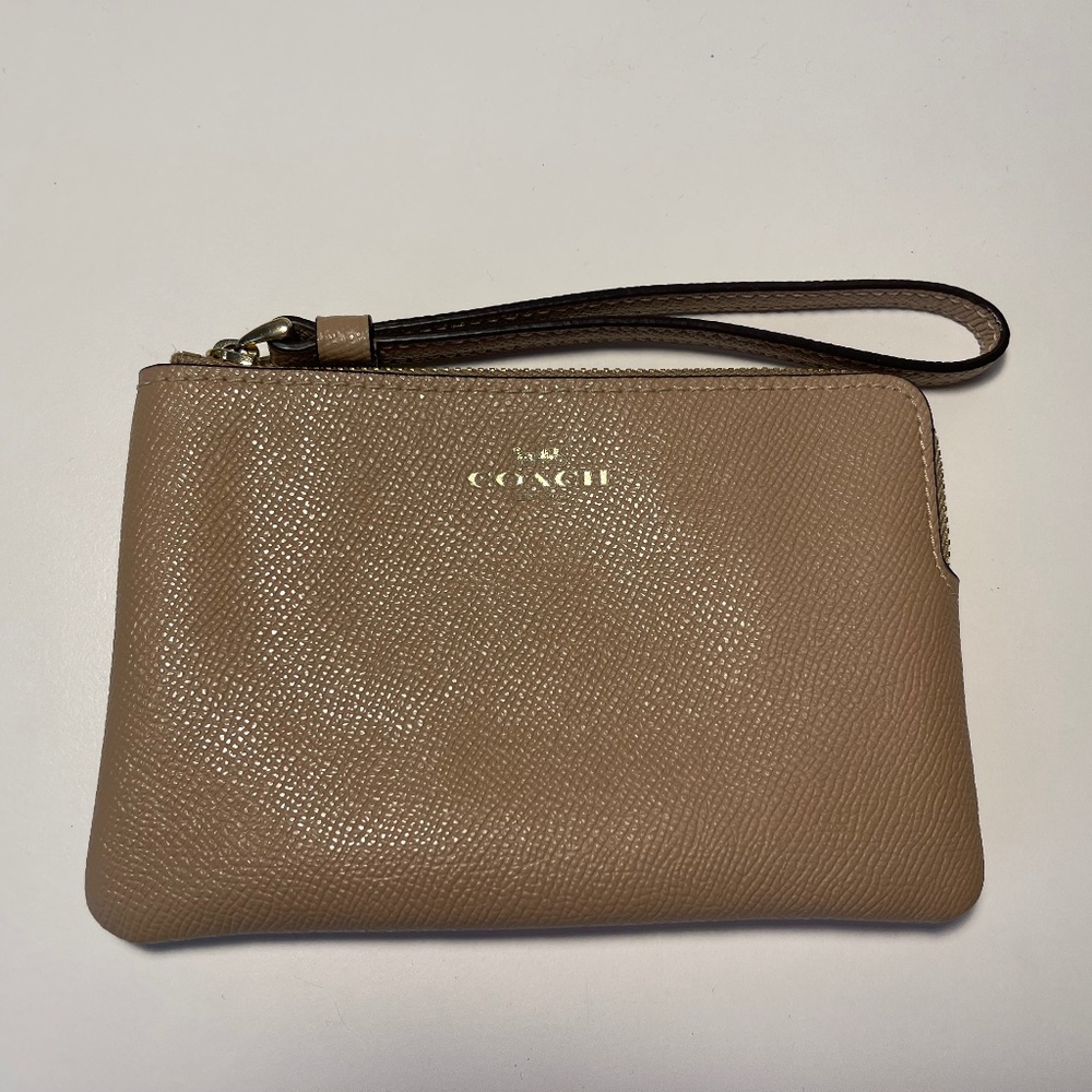 COACH wristlet in beige
